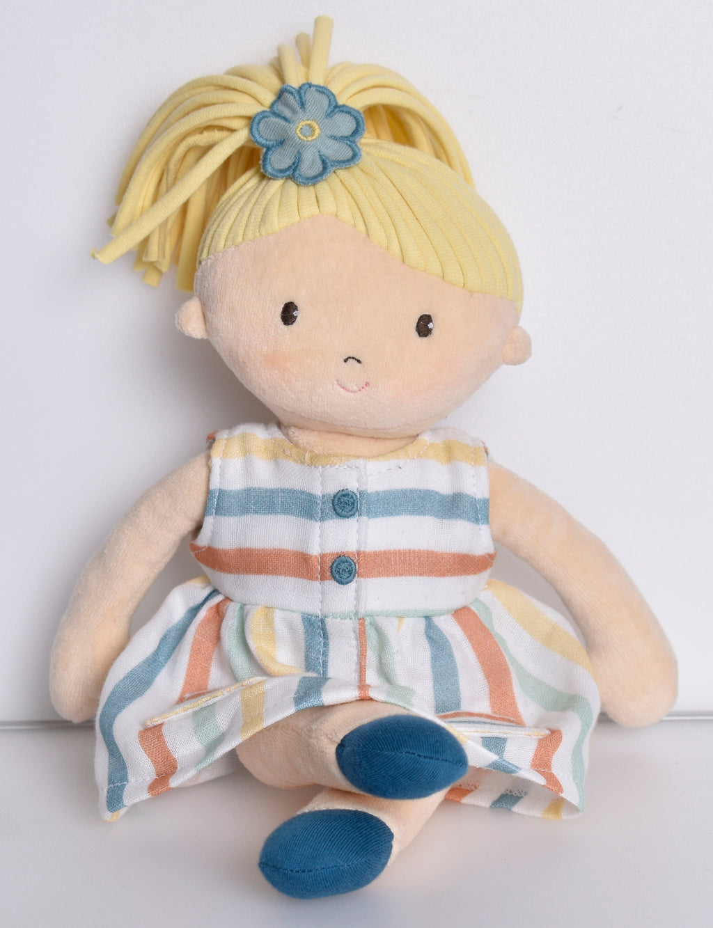 Blonde-Haired Soft Doll in Colorful Striped Dress