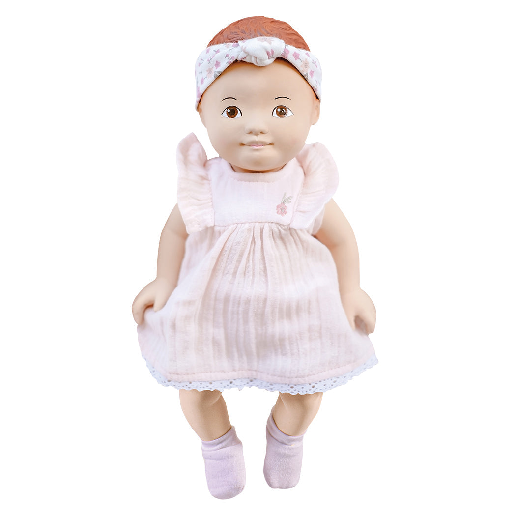 Poupée bébé en caoutchouc naturel avec vêtements amovibles en coton