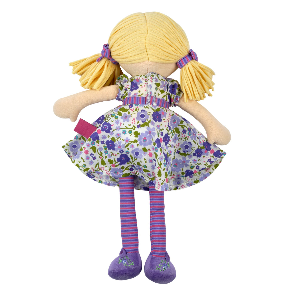 Poupée blonde en robe lilas et rose