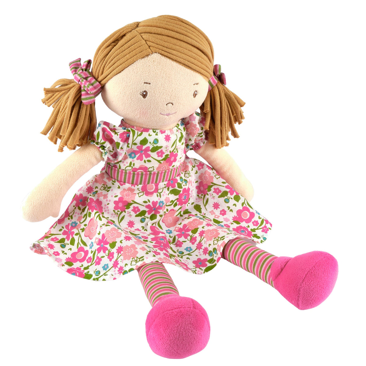 Hellbraunhaarige Rag-Doll-Puppe im dunkelrosa und grünen Kleid