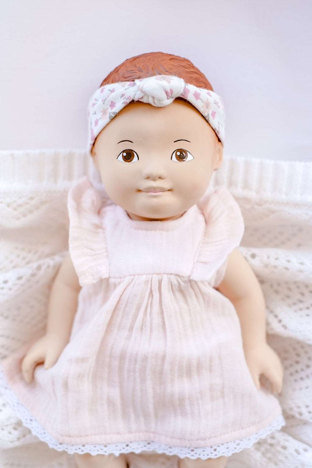 Natural Rubber Baby Doll with Removable Cotton Clothing