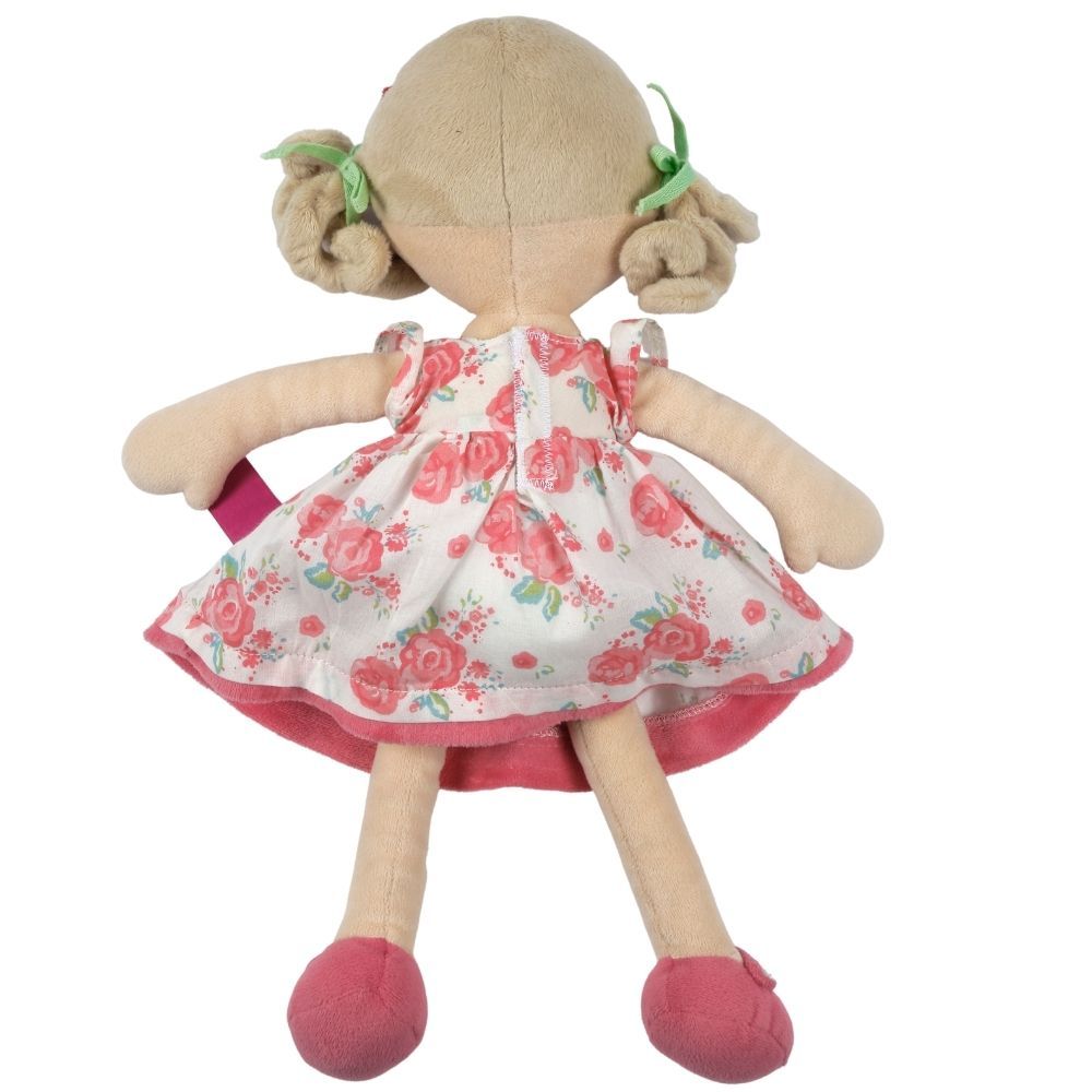 Poupée souple aux cheveux beige en robe rose à fleurs