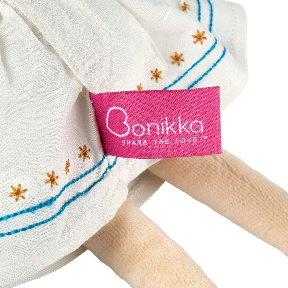 Bio-Weichpuppe mit besticktem Kleid & rosa Jacke