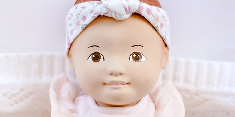 Natural Rubber Baby Doll with Removable Cotton Clothing