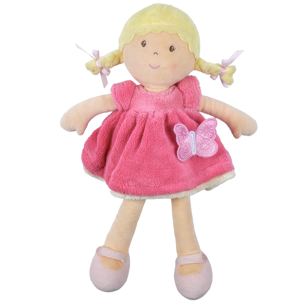 Poupée douce aux cheveux blonds en robe rose et blanche